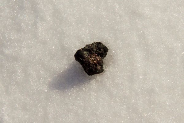 Chebarkul meteorite sample on lake ice